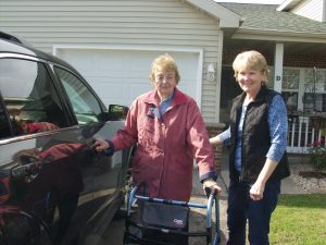 Pat Meulemans (right) of Kaukauna picks up Rita Trader at her home in Menasha. 