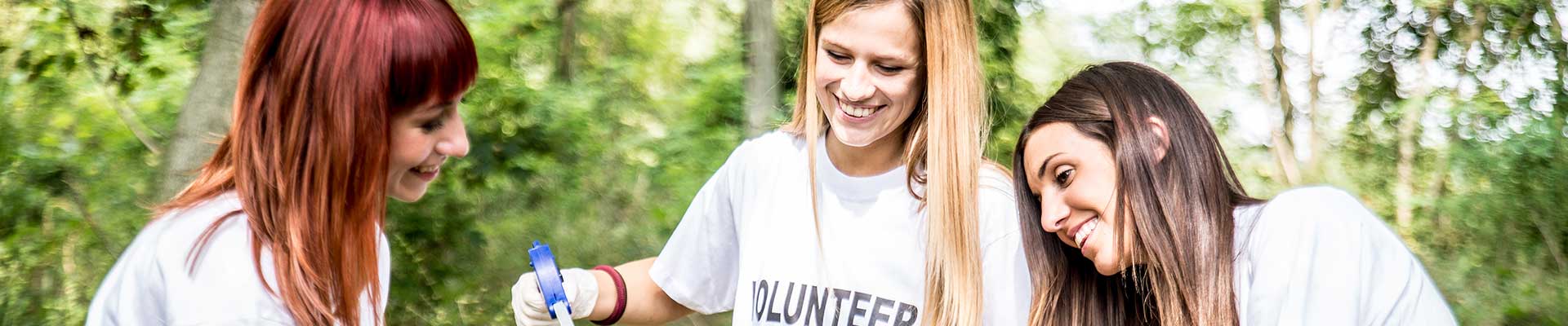 Volunteers cleaning up garbage.